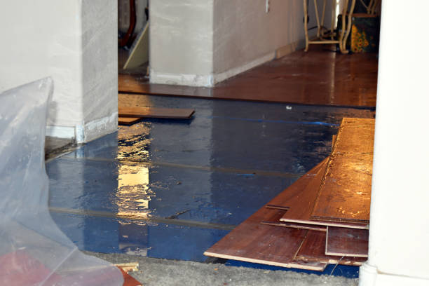 Professional Flood Damage Restoration technician working in Riverside, WA